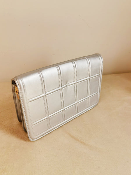 Cartera plateada