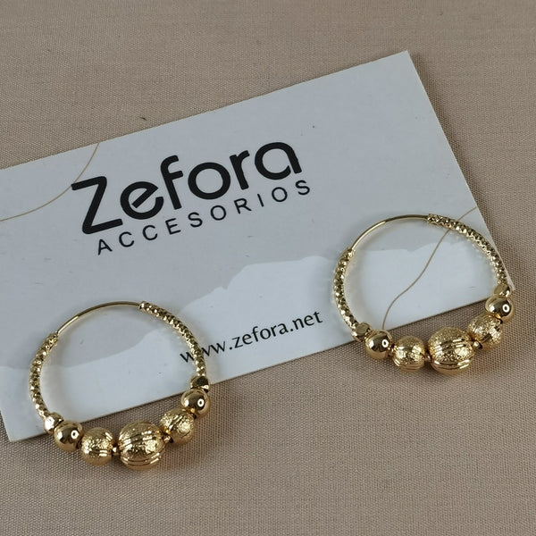 aretes de mujer