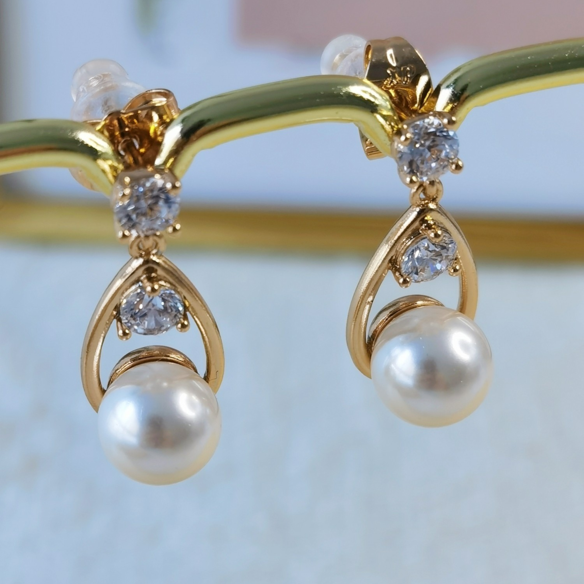 Aretes perla